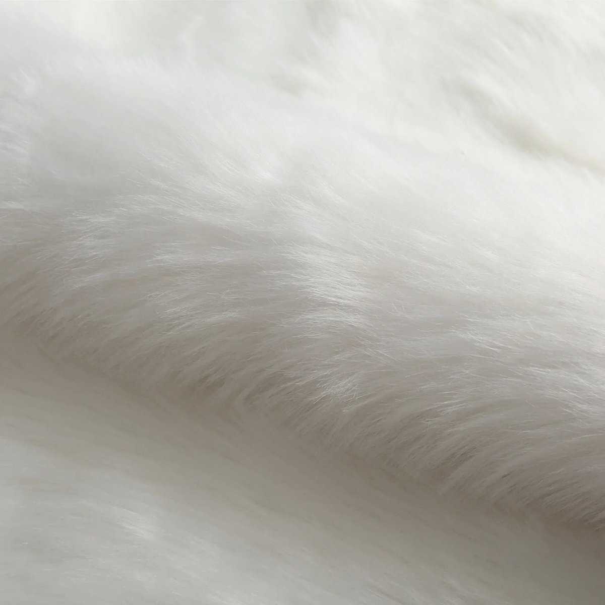 Tapis blanc en fausse fourrure Tapis blanc en fausse fourrure
