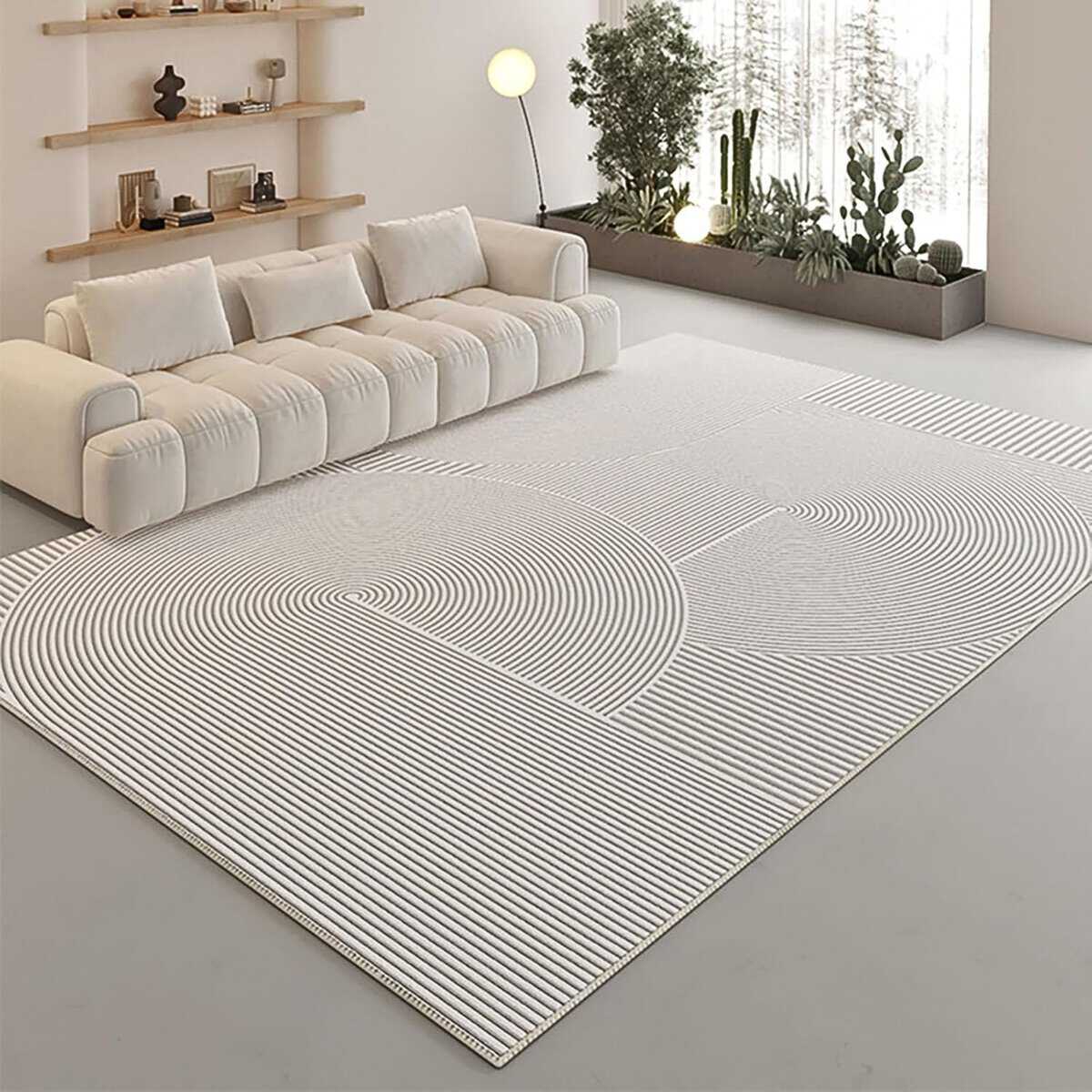 Tapis blanc moderne avec motifs géométriques Tapis blanc moderne avec motifs géométriques
