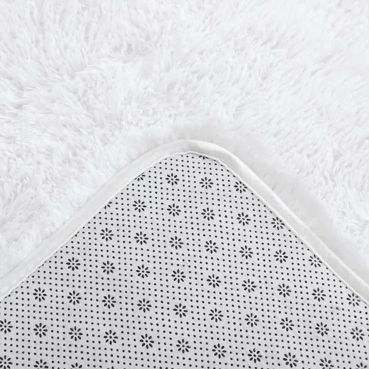 Tapis blanc rond et moelleux Tapis blanc rond et moelleux