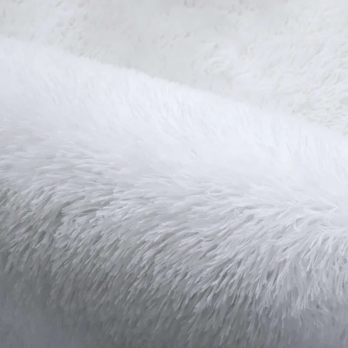 Tapis blanc rond et moelleux Tapis blanc rond et moelleux