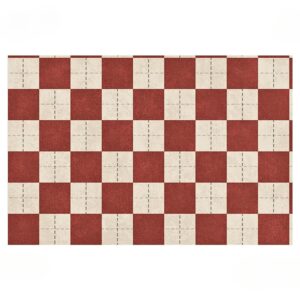 Tapis rouge à motifs. Design dynamique, confort optimal, durabilité assurée. Idéal pour ajouter une touche de style et de couleur à votre intérieur.